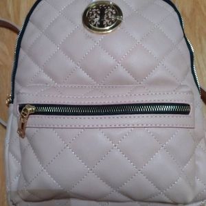 Small pink backpack